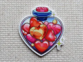 A Heart Shaped Bottle of Hearts Needle Minder, Cover Minder, Magnet