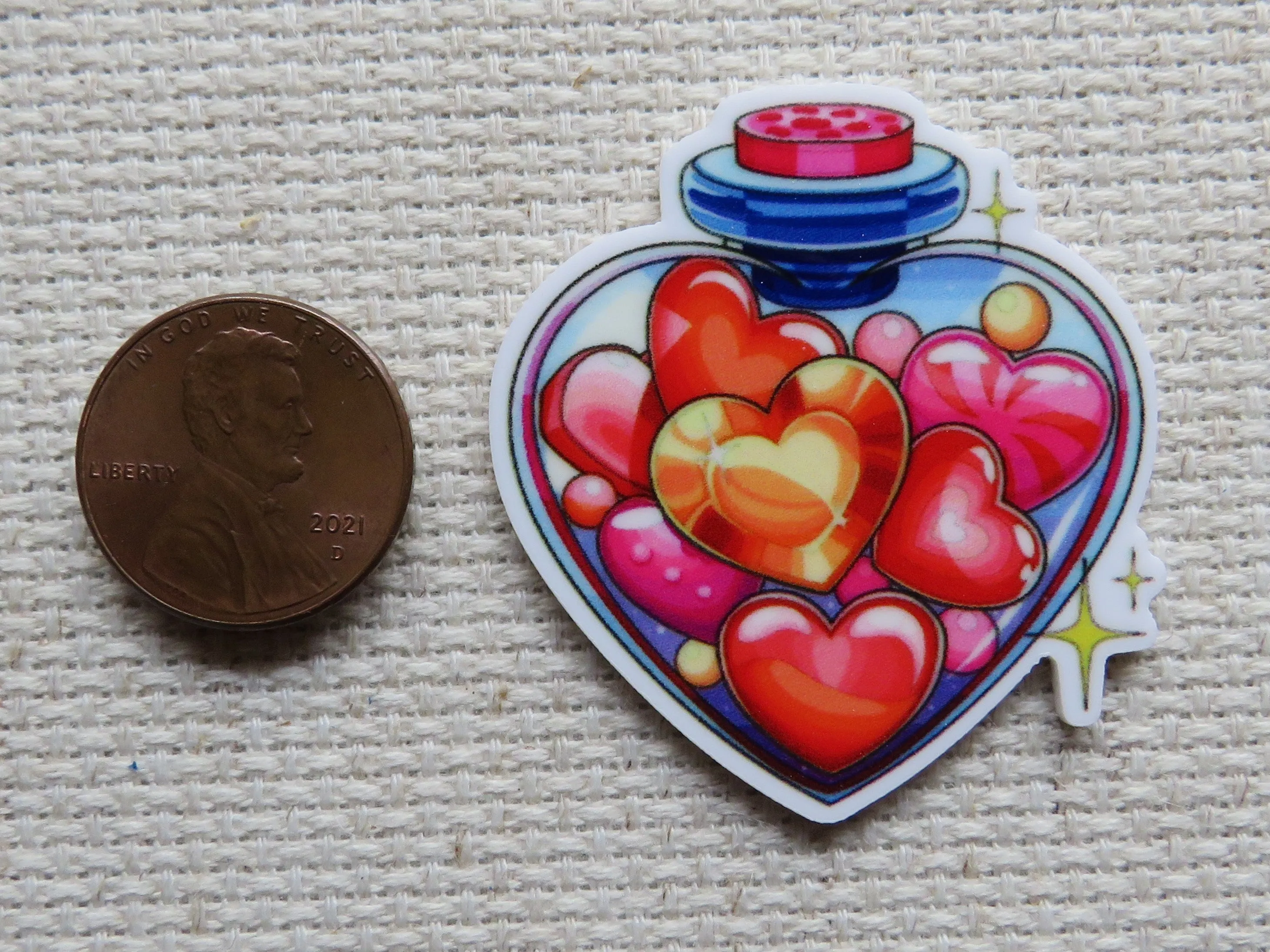 A Heart Shaped Bottle of Hearts Needle Minder, Cover Minder, Magnet